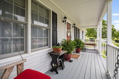 Full front porch to enjoy you coffee