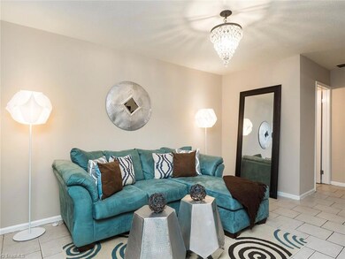 Great sized living room with updated light fixture.