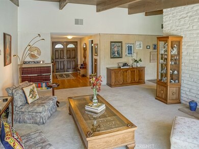 Double entry door opens to a great family room with high ceilings!