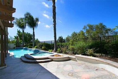 Lots of space for dining and sunning by the pool.
