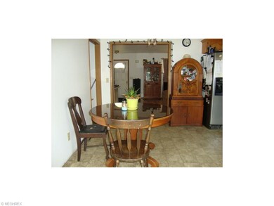 Dinette off of kitchen; view into living room