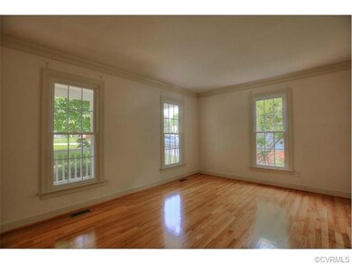 Living Room with refinished warm tone hardwood flo