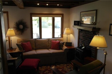 Living room area with views of Day...