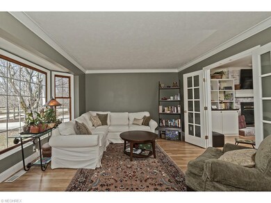 The living room opens into the family room through