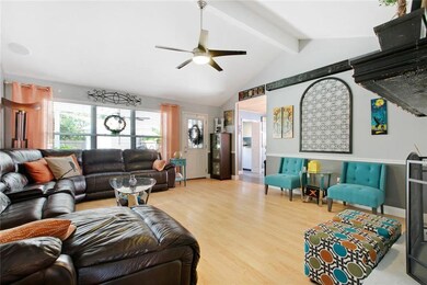 What a great open family room with bar and wood bu