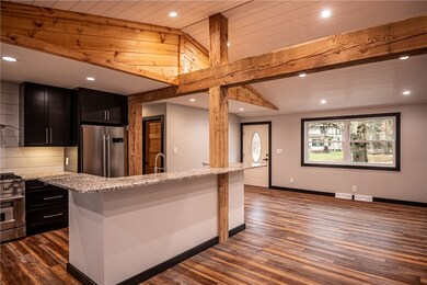 Large entry greets you with vaulted ceiling, expos