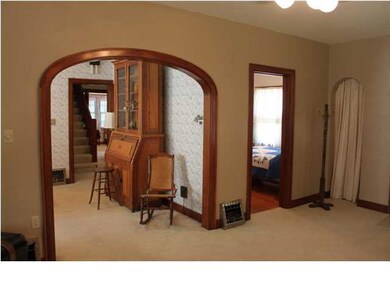 Flawless Walnut wood work and arched designer deta