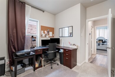 Secondary bedrooms and bath are positioned at the