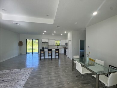 Kitchen with stainless steel appliances, recessed