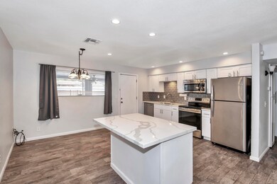Kitchen opens u to backyard