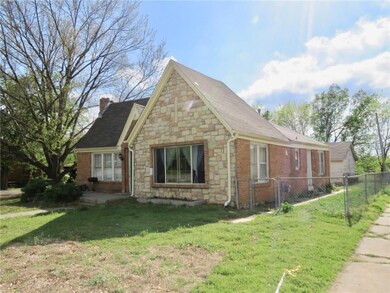 View of the north side of the home and fenced yard.