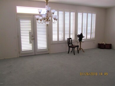 Formal living-dining with French door to