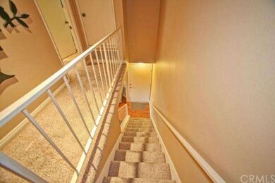 View from upstairs to front door.