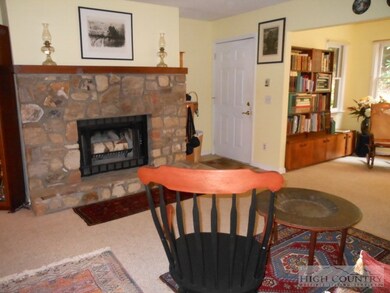 Stone Fireplace: The handsome stone woodburning fi