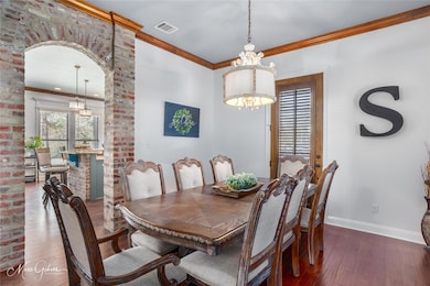 Dining space featuring dark hardwood / wood-style 