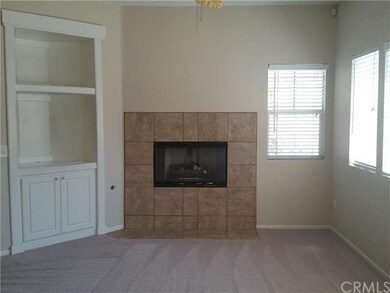Built -In Media Niche with Romantic Tiled Fireplac