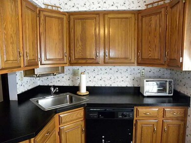 Kitchen. Corner sink with plenty of counter space 