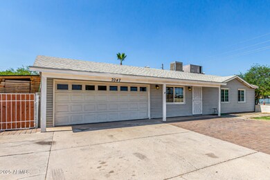 7047 W Almeria Rd, Phoenix, AZ 85035 - photo 3