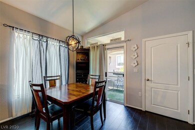 Dining area with upgraded fixtures, slider to pati