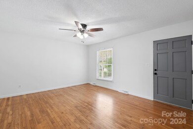 Spacious Living Room with Wood Floors
