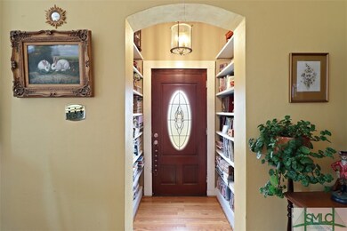 Foyer Entrance ~ Built in Bookcases on Both Sides