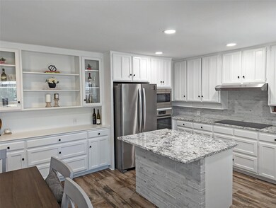 Living room with beautiful tile flooring.