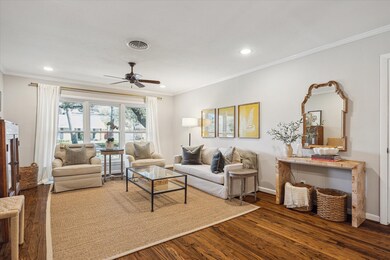 Beautiful living room with picture windows (seller