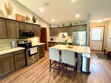 Vaulted ceilings make it feel even more spacious!