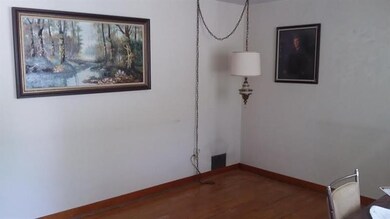 Exposed wood floors in the Living room