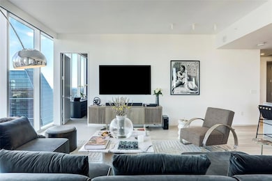 Living area featuring light wood-style flooring