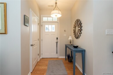 Foyer with light hardwood floors