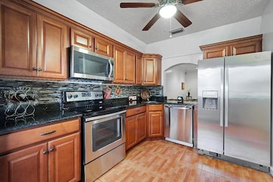 Wood Cabinetry - Stainless Steel Appliances