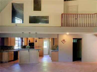 Roomy kitchen with atrium room above