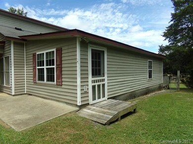 Side view entry into storage and utility room.