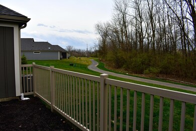 view of walking path and woods