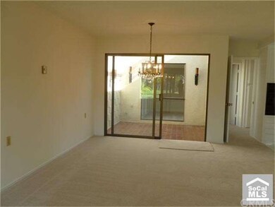 Dining room with new carpet & fresh paint with sli