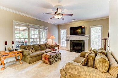 Family Room with Fireplace and Ceiling Fan