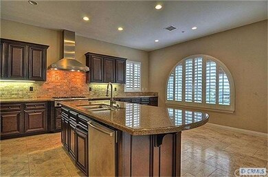 Elegant dark wood cabinets & Granite counter top