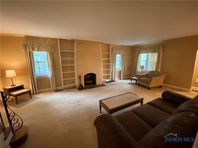 SPACIOUS FAMILY ROOM WITH FIREPLACE AND NEWER WIND