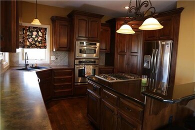 1230 Edwards Cir, Raymore, MO 64083 - photo 2