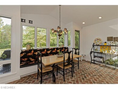 The over-sized eating area in the kitchen has banq
