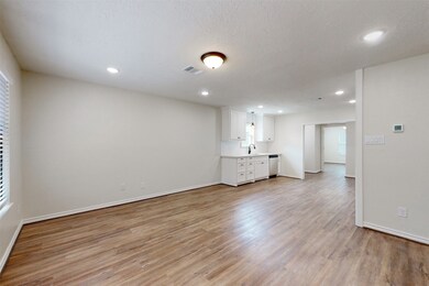 View from the living room of the kitchen area.