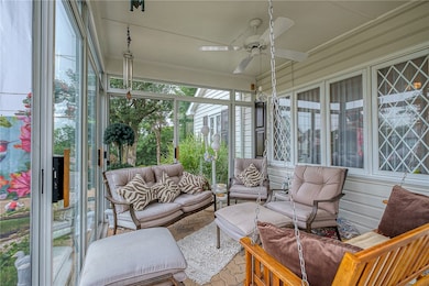 Spend time relaxing on this beautiful sunroom!