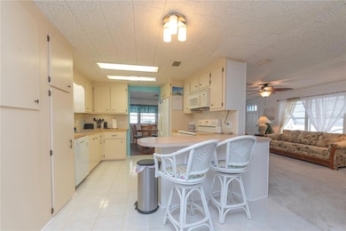 Kitchen with breakfast bar.