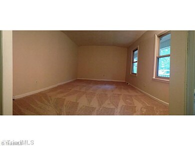 Living Room. Living room looks out to front porch and lets in lots of beautiful natural light.