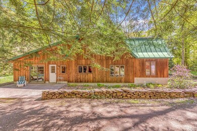 BACK OF HOUSE WITH PATIO