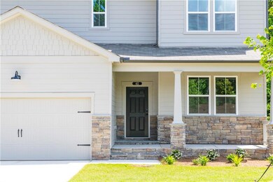 Property entrance with a garage