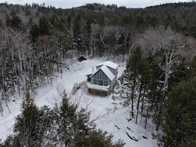 1.6 acres, but surrounded by woods for privacy