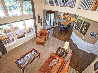 Two story family room with brand new carpet and fl