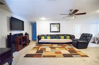 The den is huge with tons of room for large and co
